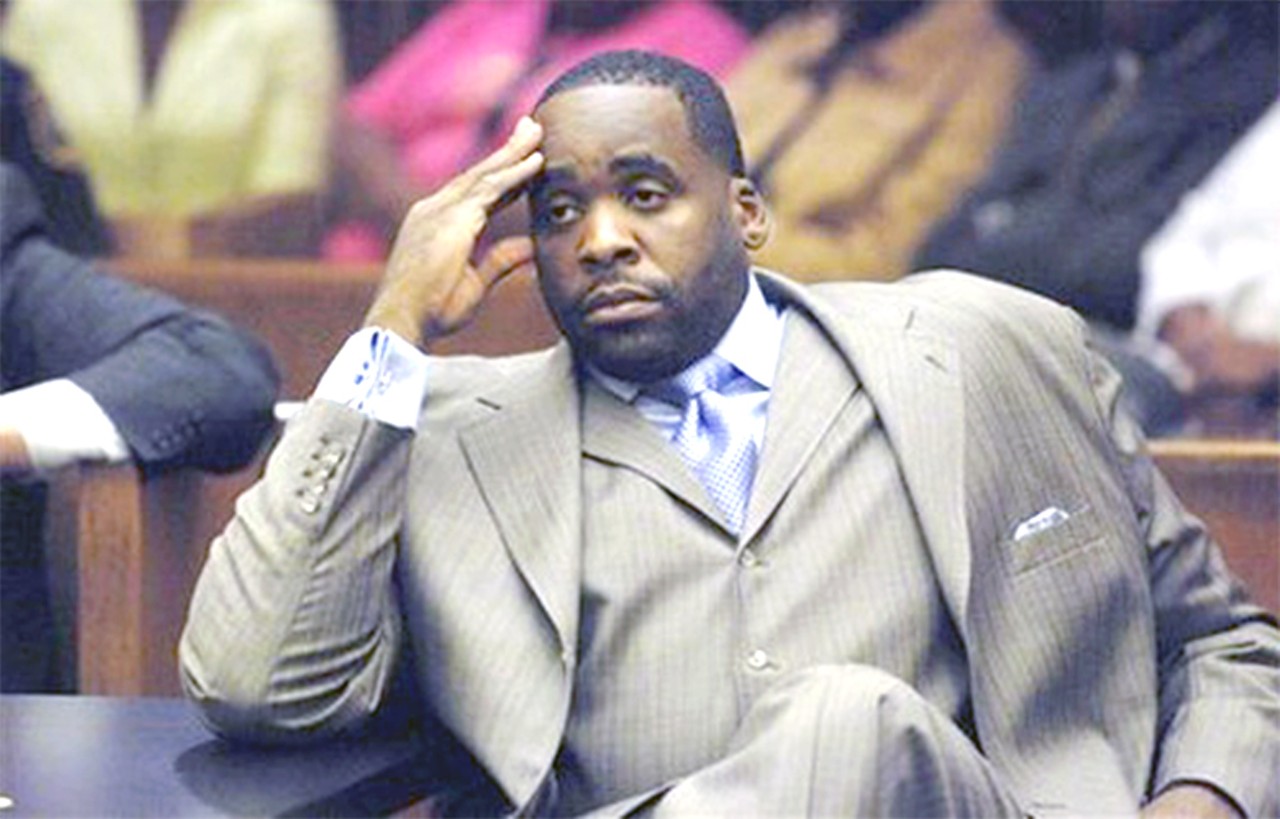   Kwame Kilpatrick:     Unless you’ve been in a coma, you pretty much know the whole ugly, pathetic story of a man who had it all, but was such a self-absorbed douche bag that he instead decided to fuck the citizens he promised to serve — and instead served himself.   He’s in prison now, for a long time. 
What a douche bag!  