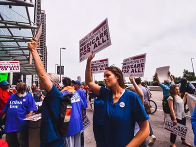 A group of people gather in Chicago in 2019 for the first ever Medicare For All Rally led by Bernie Sanders.