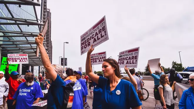 A group of people gather in Chicago in 2019 for the first ever Medicare For All Rally led by Bernie Sanders.