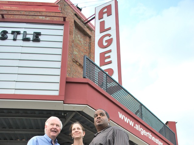Geoff Gowman, Helen Broughton and Conroy Jointer in front of their beloved theater.
