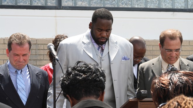 Kwame Kilpatrick and other officials at a public prayer rally.