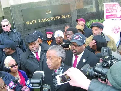 The Rev. Al Sharpton and other activists announce the filing of a federal lawsuit challenging the constitutionality of Michigan’s Emergency Manager Law.