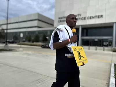 Lamarr Monson, who was exonerated of murder, rallied outside the Wayne County Prosecutor's Office to reopen cases handled by former Detroit Detective Barbara Simon.