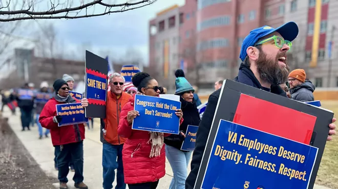 More than 100 federal workers and their allies turned out to protest cuts to veterans' services in Detroit.