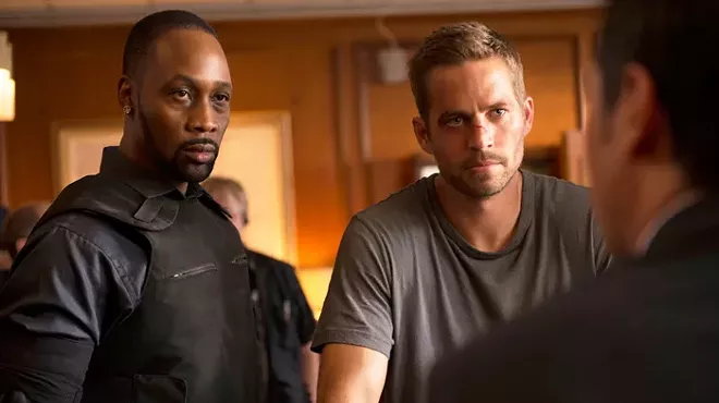 Paul Walker “goes native” as a Detroiter in this really dumb actioner.