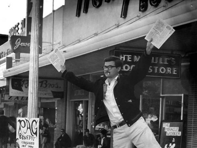 The late George Vizard and Mariann Vizard (now Mariann Wizard) hawking The Rag in Austin, Texas. The Rag was one of hundreds of underground papers.