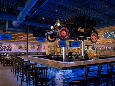 Ford’s Garage boasts an automotive theme complete with a vintage car suspended over its bar.