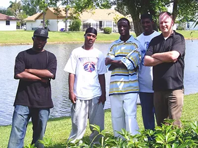 In warmer climes: Oak Park Knights Matthew Waddell, Clayton Day, Earl Murrie and Robert Johnson with Coach Boyer in Florida.