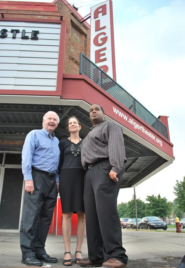 Geoff Gowman, Helen Broughton and Conroy Jointer in front of their beloved theater.