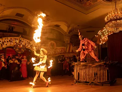 Zombo the Clown and a fire dancer at Detroit's popular Halloween event Theatre Bizarre.