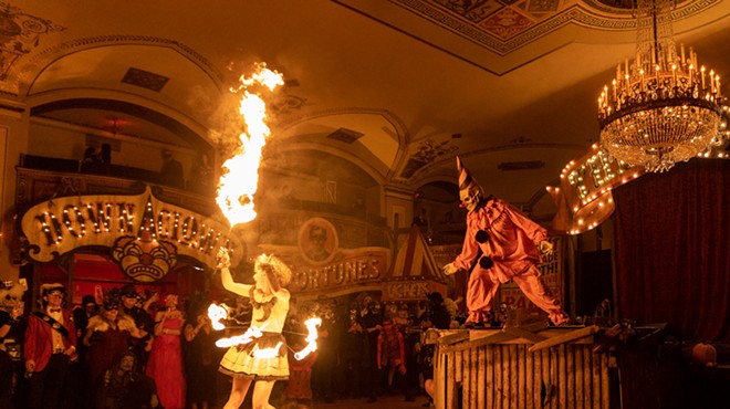 Zombo the Clown and a fire dancer at Detroit's popular Halloween event Theatre Bizarre.