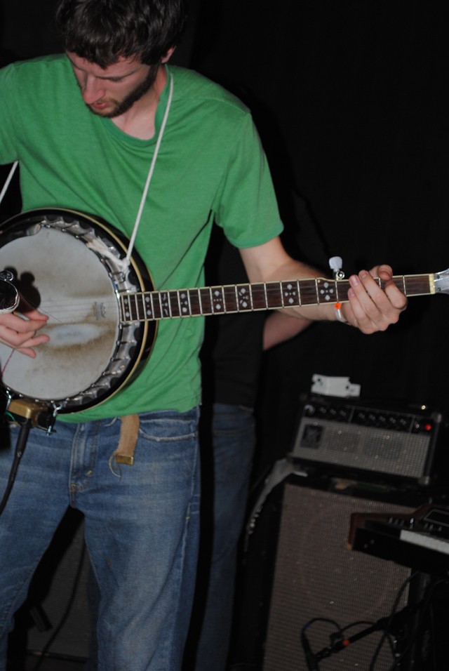 Guitarist Ben Audette switches to banjo.