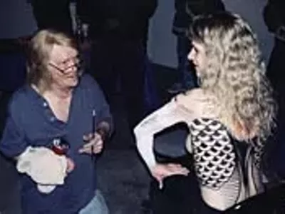 Image: Gun moll goes wild