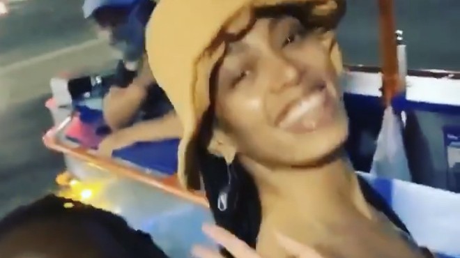A fan notices Solange cruising on a pedal pub in Detroit.