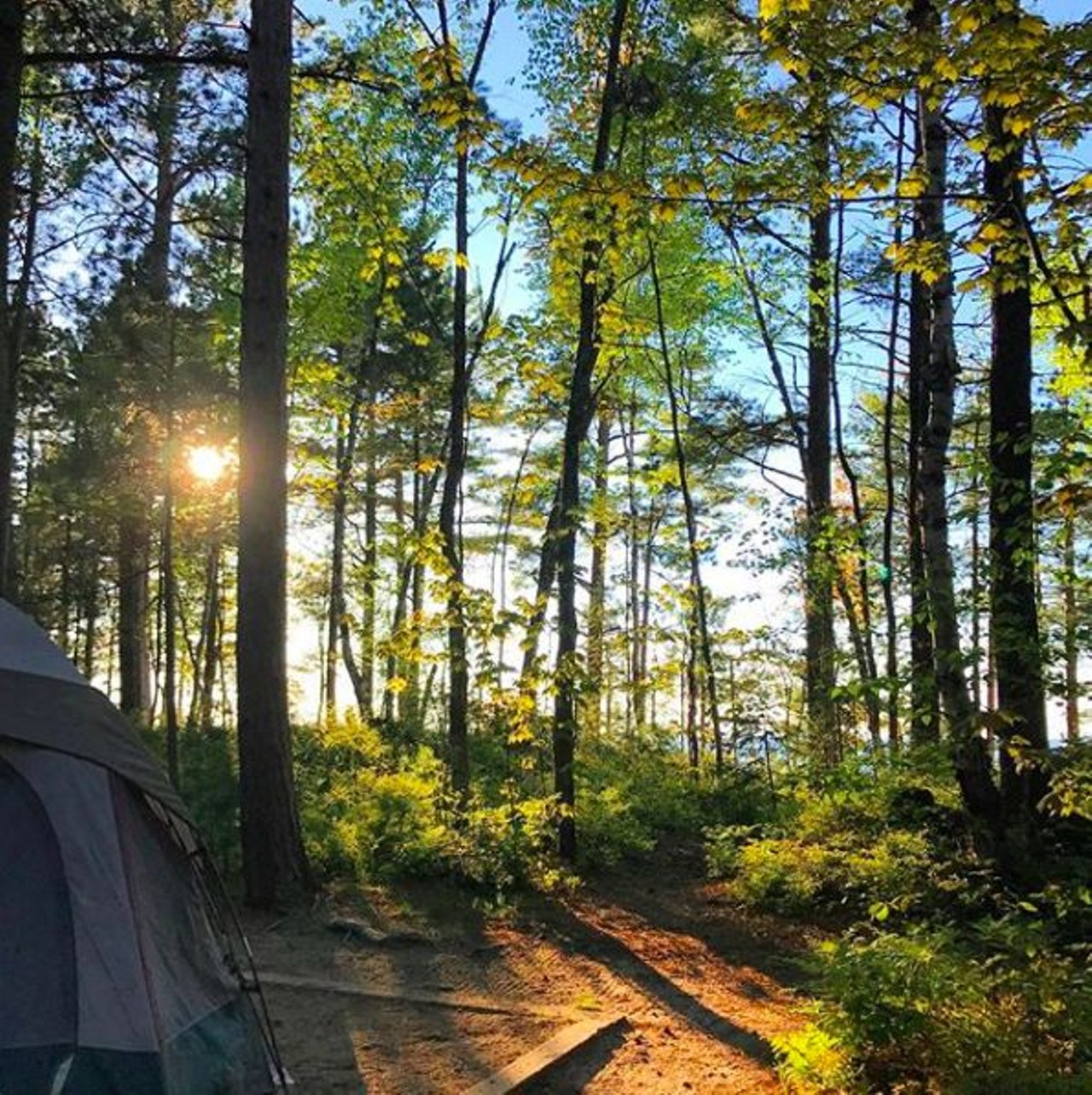 12 Mile Beach Campground
Grand Marias, MI
It is a bit of a drive to get to this campground, but the views are worth it. Located on the Pictured Rocks National Lakeshore, it is nothing short of breathtaking. Set up your tent in between the tall trees of northern Michigan and steps away from the beach. 
Photo via IG user @katlynmagee