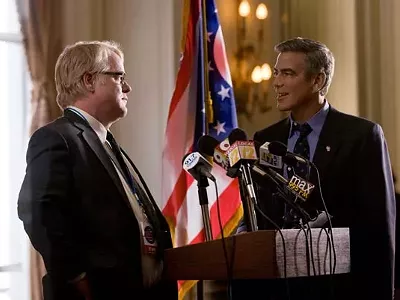 The suit makes the man: Philip Seymour Hoffman and George Clooney in Ides of March.