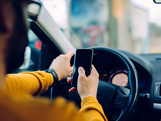 In Michigan, it is illegal to use a cellphone while driving.
