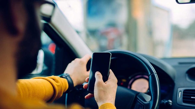 In Michigan, it is illegal to use a cellphone while driving.