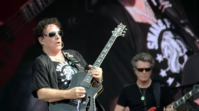 Streetlight people: Journey's Neal Schon and Ross Valory, somewhere in the night.