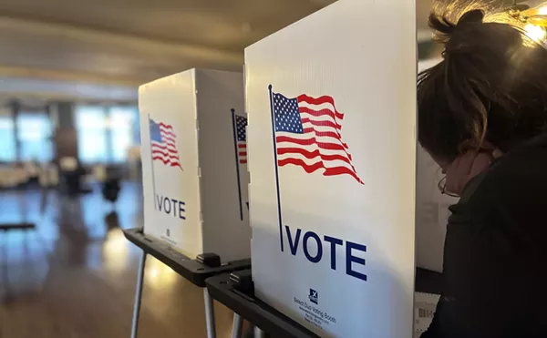 Voting at a precinct in Detroit.
