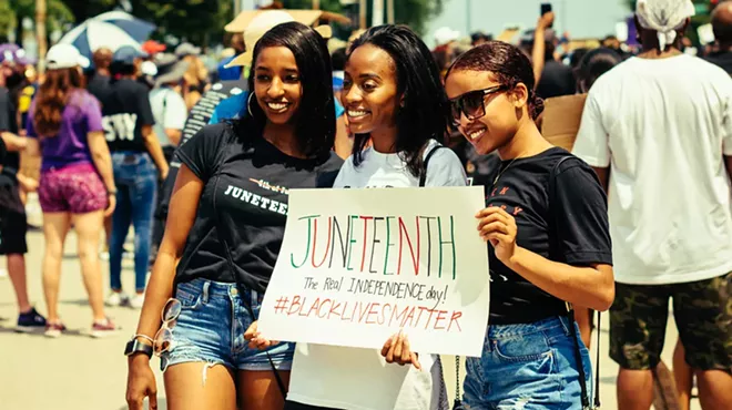 Young women celebrate Juneteenth in Grant Park, Chicago on June 19, 2020.