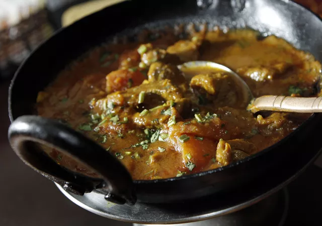 Karai lamb and &quot;Chicken Tikka Masala Sizzler,&quot; from Mazza Indian Cuisine in Berkley.