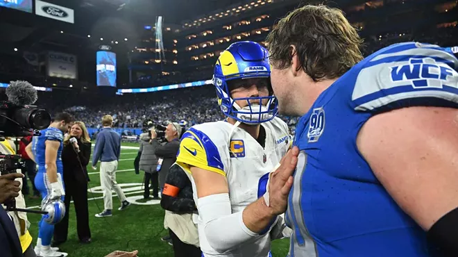 Los Angeles Rams QB Matthew Stafford congratulates Detroit Lions guard Graham Glasgow while walking off the field following the game between Los Angeles Rams and Detroit Lions on Jan. 14 at Ford Field.