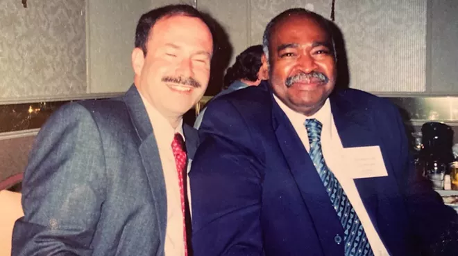 Columnist Joe Lapointe, left, with childhood friend Gregory Glenn in 2003.