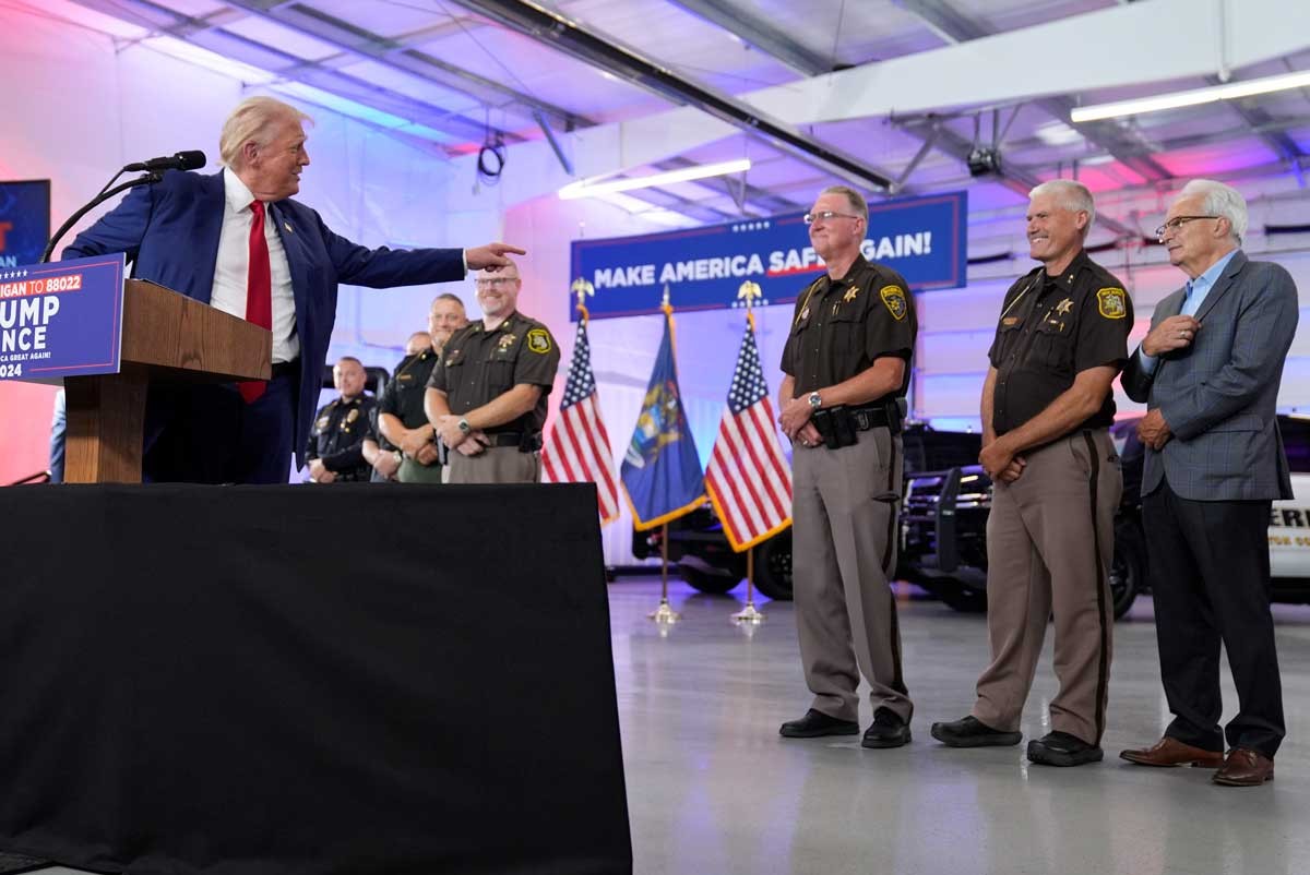 Republican presidential nominee and former President Donald Trump speaks on crime and safety during a campaign event at the Livingston County Sheriff's Office, Tuesday, Aug. 20, 2024, in Howell.