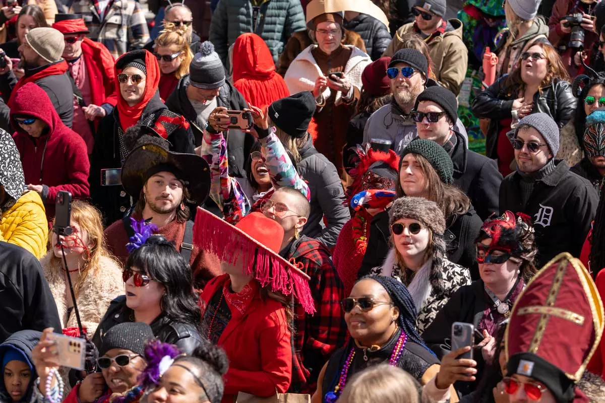 Image: Attendees dress in red at the Marche du Nain Rouge.