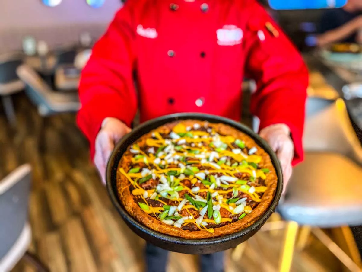 Image: Detroit Coney Chicago-style pizza from Uno Pizzeria & Grill in Farmington Hills.