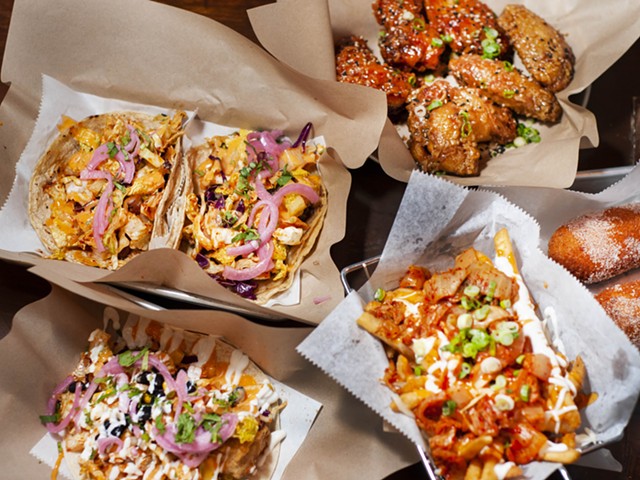 From bottom left: Fish taco, bulgogi and spicy pork tacos, wings, moz dogs, and kimchi fries.