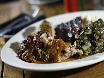 Chef Alex's &quot;Bearded BBQ Plate,&quot; with Memphis-style ribs, barbecued beef, South Carolina pulled pork, pit-smoked chicken, with mashed local potatoes and bacon-braised greens from Zingerman's Roadhouse in Ann Arbor.