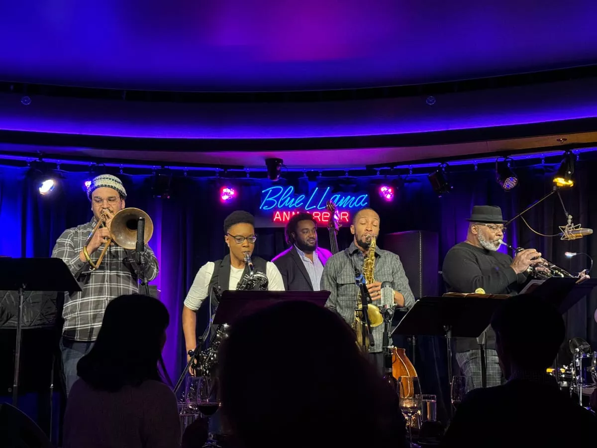 Image: From left to right: Zekkereya El-Magharbel (trombone), Erinn Alexis (baritone saxophone), Jonathan Muir-Cotton (bass), Marcus Elliot (saxophone / bandleader), and Dwight Adams (trumpet).