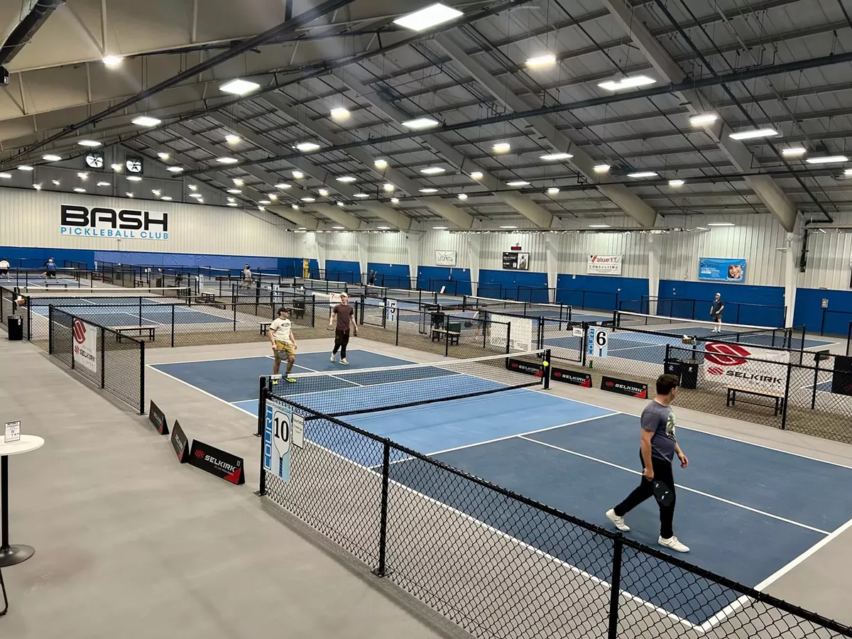 Image: Bash Pickleball Club in Warren has 10 professional grade courts under bright lighting.