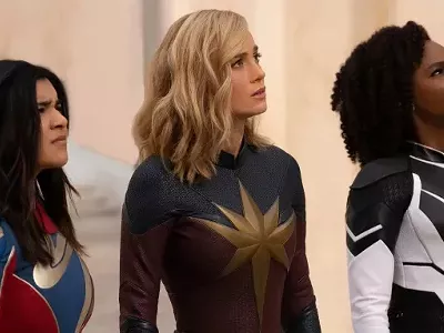 Iman Vellani as Ms. Marvel, Brie Larson as Captain Marvel, and Teyonah Parris as Captain Monica Rambeau in The Marvels.