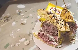 Michael’s corned beef, pastrami, cole slaw, Russian dressing and Swiss cheese on an onion roll, from Parrot Cove. - MT Photo: Rob Widdis