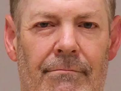 Image: Michigan man sentenced for pointing BB gun at Black man who was grilling with his child