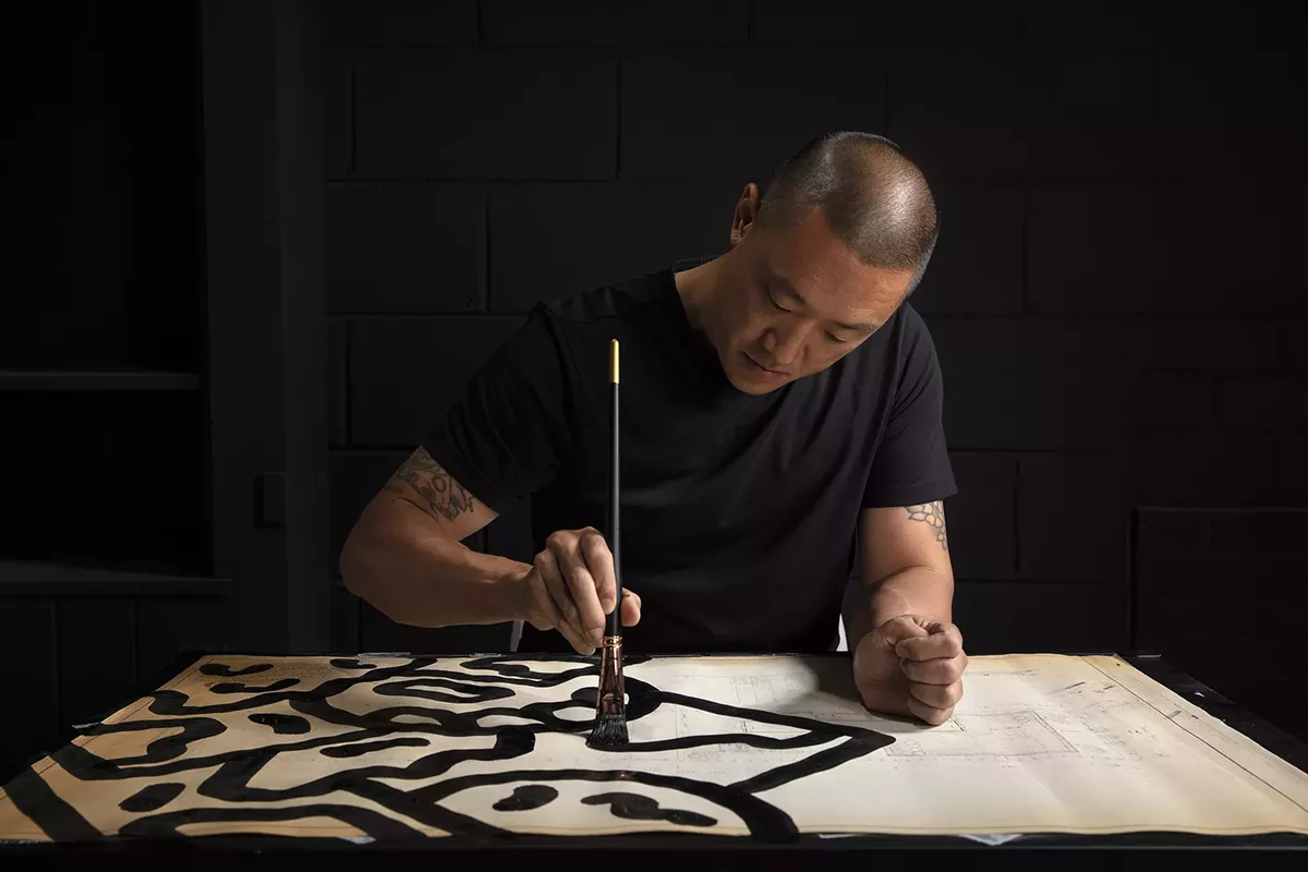 mike-han-working-on-his-modern-vandalism-minoru-yamsaki-series.webp
