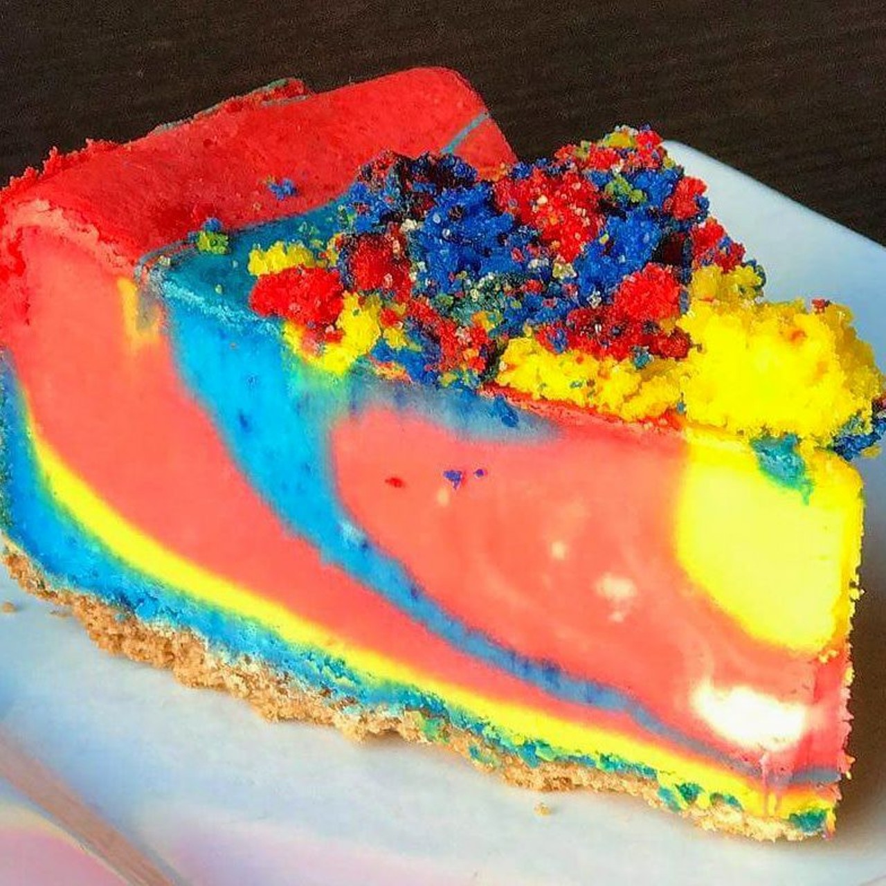 Superman Cheesecake
Kitty&#146;s Cheesecakes & More
681 E. Eight Mile Rd., Ferndale; 248-336-2253
kittyscheesecakes.com
Sometimes you want to feel like a kid and an adult. Sometimes you want to dream and live your life. Sometimes you want to eat a rainbow. With Kitty&#146;s Superman Cheesecake, you can do all of this. Live your dreams and taste the rainbow. 
Photo from Kitty&#146;s Cheesecakes & More / Facebook