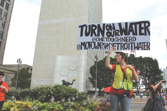 More than 1,000 people took to the streets of downtown Detroit to demonstrate against the city’s ongoing water shutoffs on July 18, 2014. The protest was organized by the National Nurses United. - Ryan Felton/Metro Times