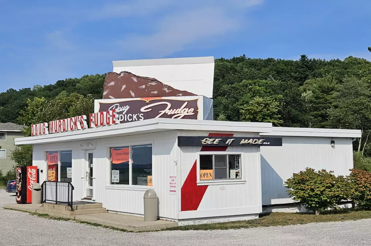 Doug Murdick’s Big Box O’ Fudge "The giant box of fudge crowning Doug Murdick’s Fudge shop in Acme has been a familiar sight to travelers along US-31 for generations. Truly a treasure of Roadside Americana. Doug Murdick is a descendant of the famous Murdick fudge family that brought fudge to Mackinac Island in 1887."