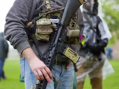 Armed protesters rallied against Gov. Gretchen Whitmer's coronavirus restrictions in May.