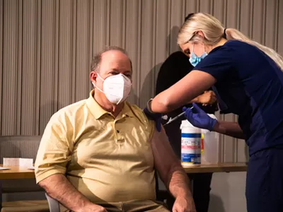 Detroit Mayor Mike Duggan got vaccinated for COVID-19 at a televised news conference as part of a campaign to build trust in the state's Black communities.