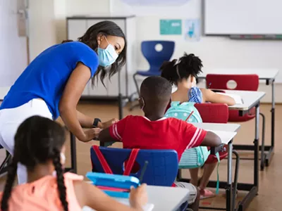 Schools without masks mandates are reporting the largest outbreaks in Michigan.