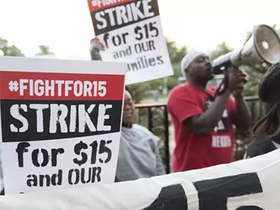 Demonstrators gather for a Fight for $15 protest outside of McDonald's restaurant in Las Vegas.