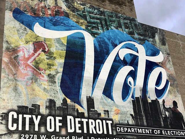 Mural in New Center in Detroit encourages people to vote.