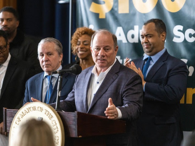 Mayor Mike Duggan discusses the Jump Start program at a news conference on Friday.
