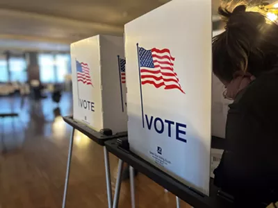 Voting at a precinct in Detroit.