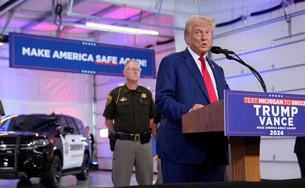 Republican presidential nominee Donald Trump spoke about crime and safety during a campaign event at the Livingston County Sheriff's Office on Aug. 20 in Howell. Standing behind him is Livingston County Sheriff Michael Murphy.